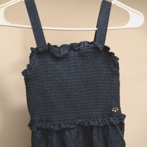 Blue jumpsuit with side pockets